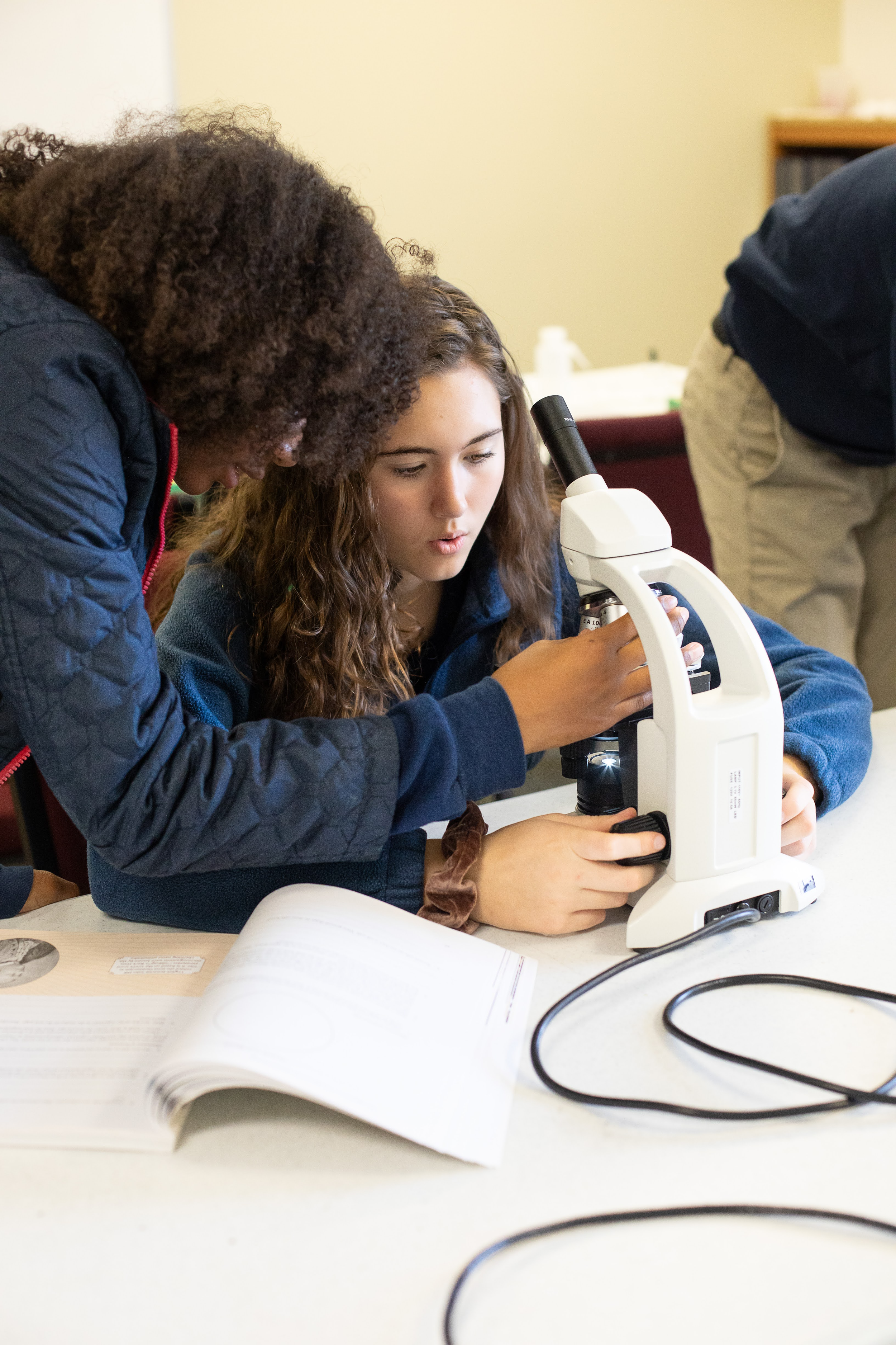 Students exploring with wisdom and wonder